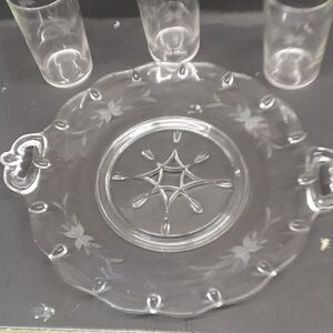 Etched flower/leaf design tray with handles and star design in middle